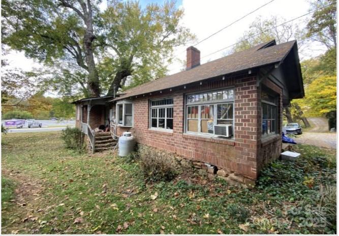 298 Speedwell Road Cullowhee, NC 28723 - Photo 19 of 20 a house view with a garden space