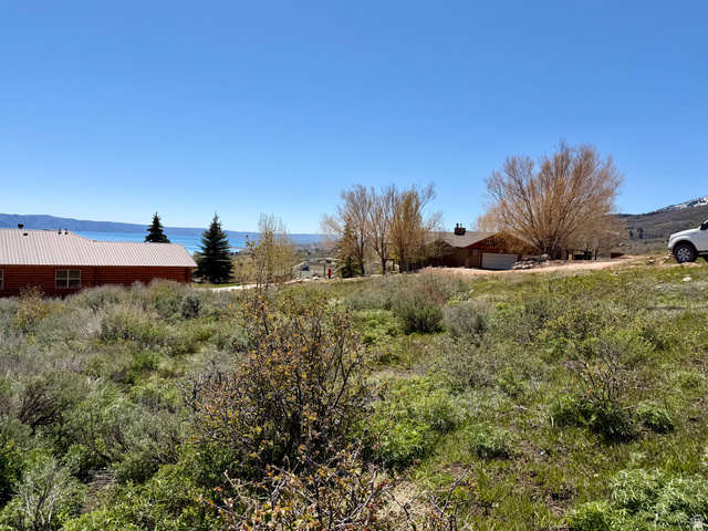 248 Canyon Ridge Way, Unit 518 Fish Haven, ID 83287 - Photo 3 of 12 View of yard featuring a mountain view and a view of rural / pastoral area
