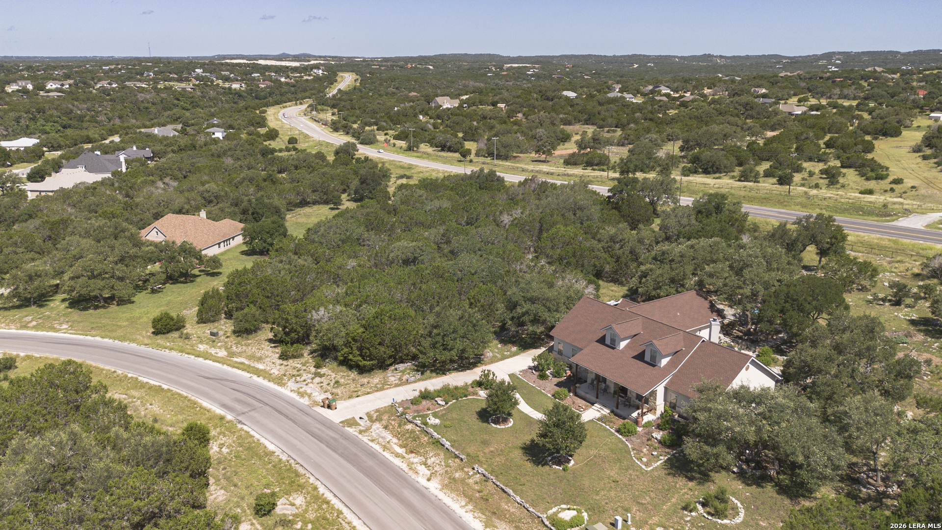 129 Blackbird Drive Spring Branch, TX 78070 - Photo 5 of 16 an aerial view of a house with a lake view