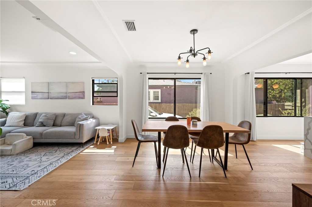 3345 Oakhurst Avenue Los Angeles, CA 90034 - Photo 21 of 49 a living room with furniture and wooden floor