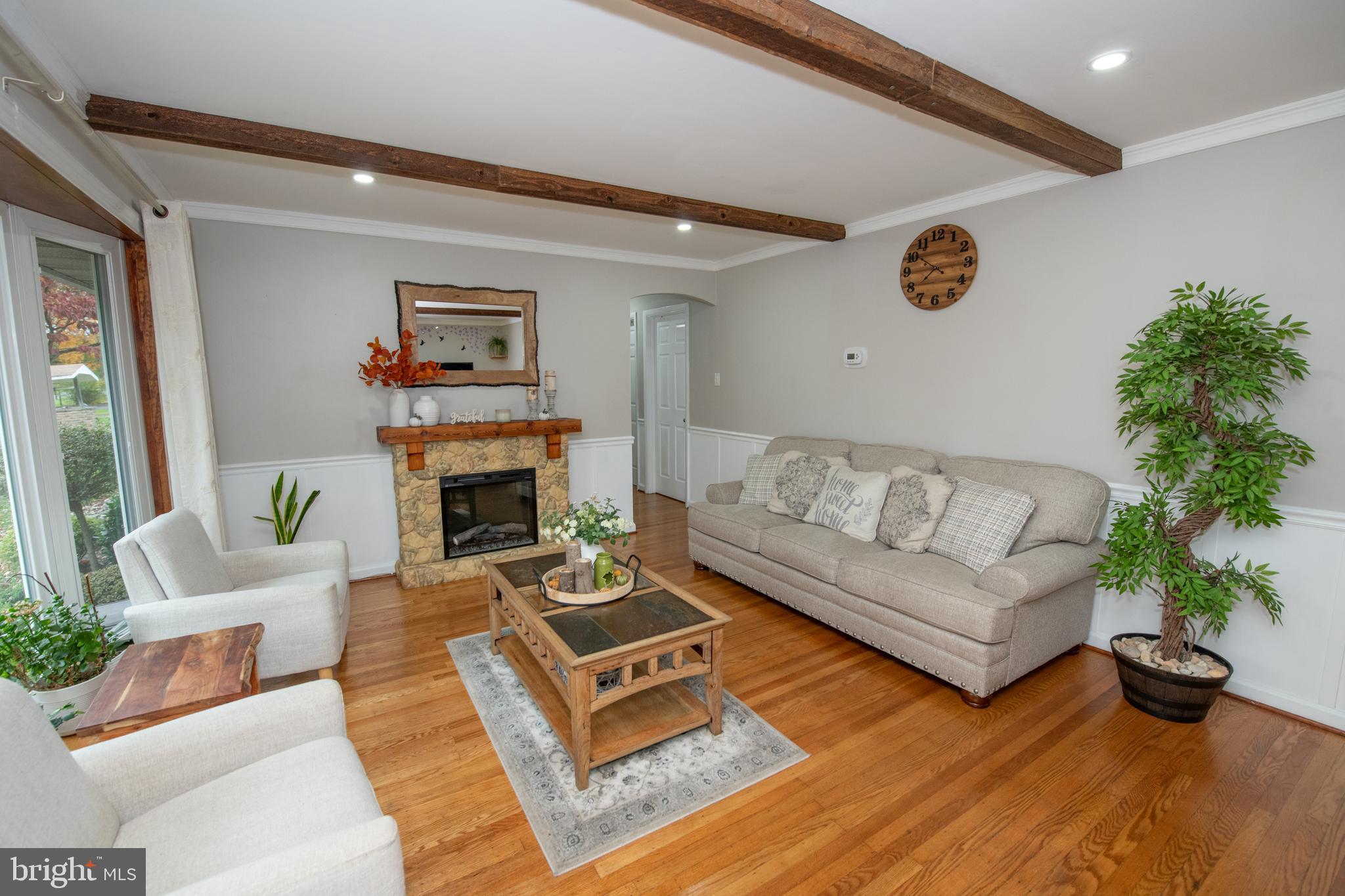 1309 Clyde Road Warminster, PA 18974 - Photo 11 of 39 a living room with furniture and a fireplace
