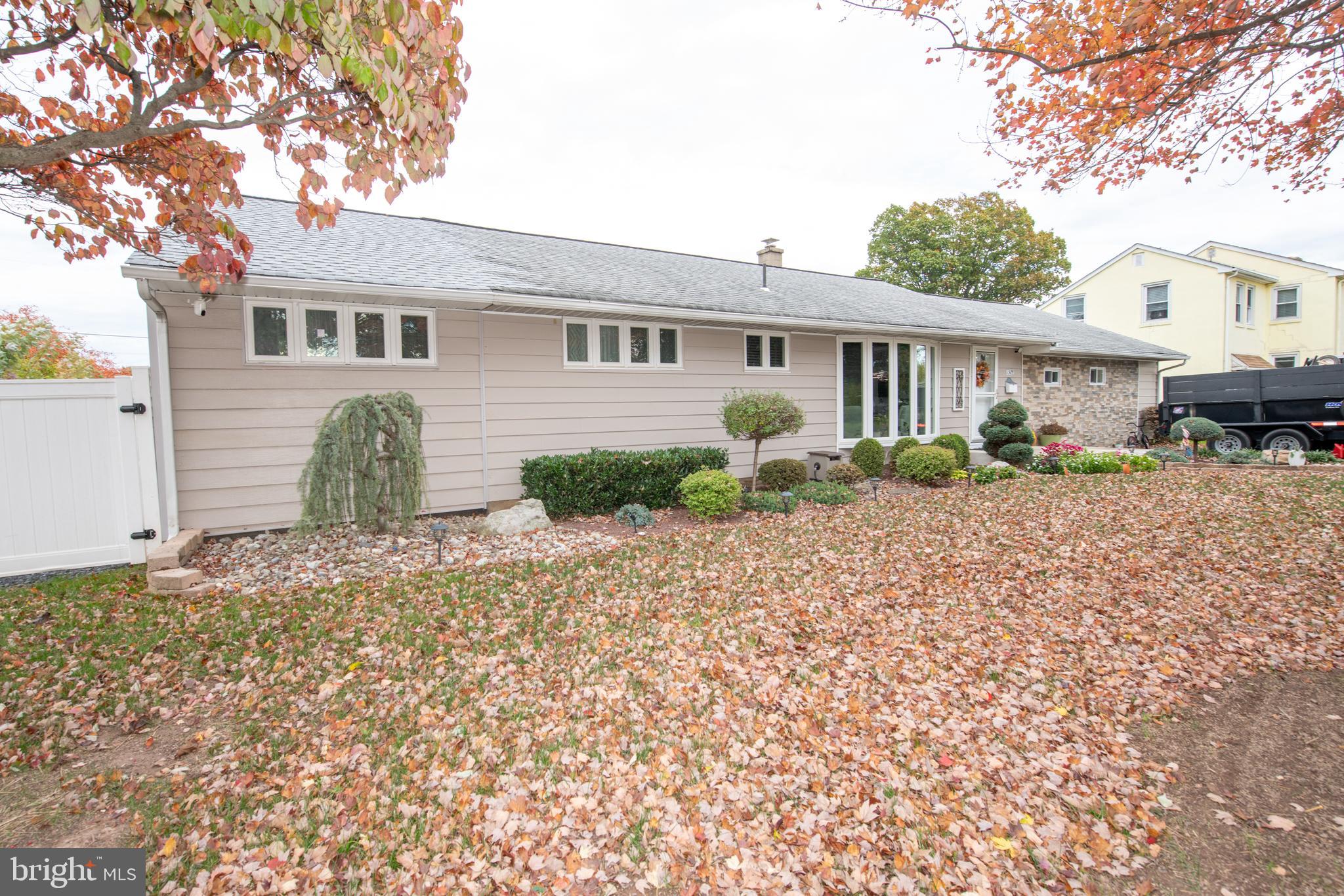 1309 Clyde Road Warminster, PA 18974 - Photo 2 of 39 a front view of a house with garden