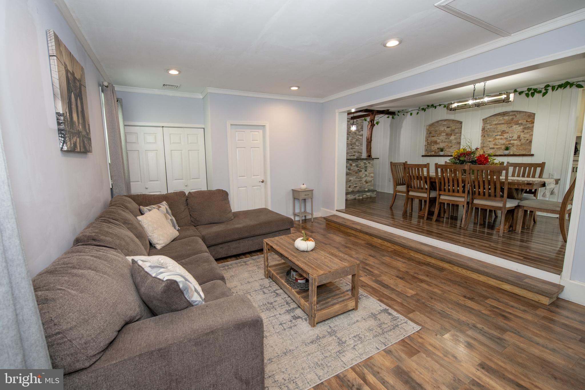 1309 Clyde Road Warminster, PA 18974 - Photo 21 of 39 a living room with furniture and a wooden floor