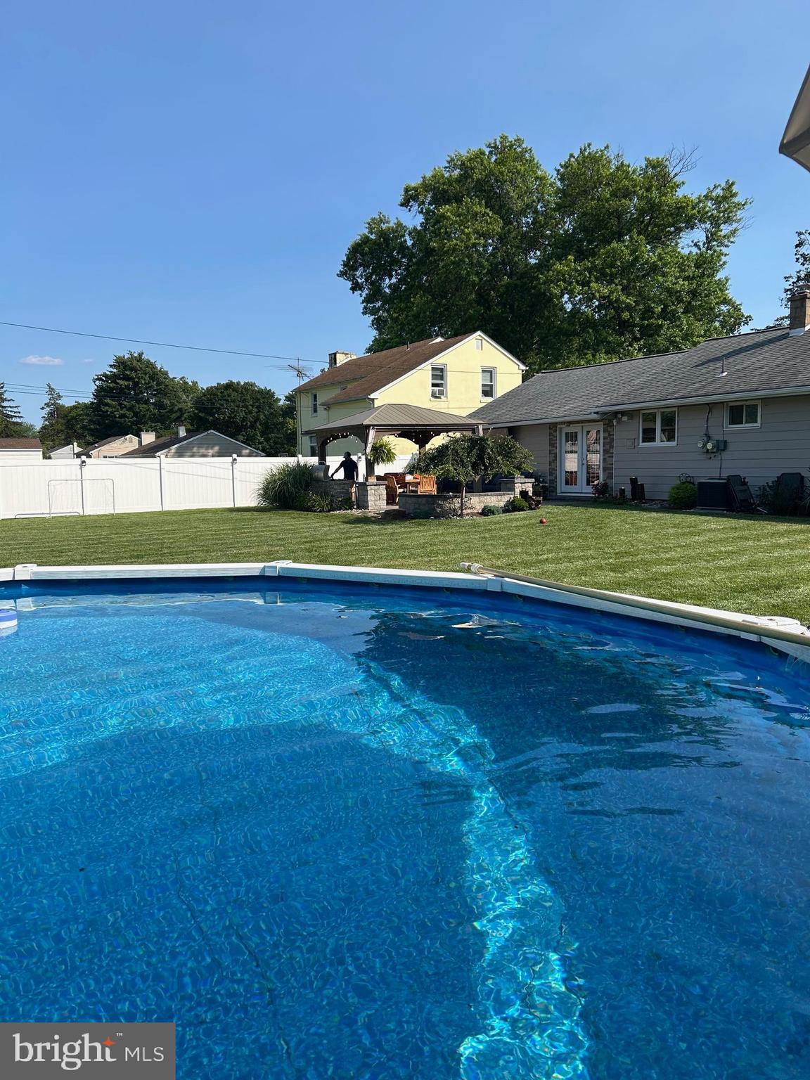 1309 Clyde Road Warminster, PA 18974 - Photo 3 of 39 a view of a big yard next to a yard