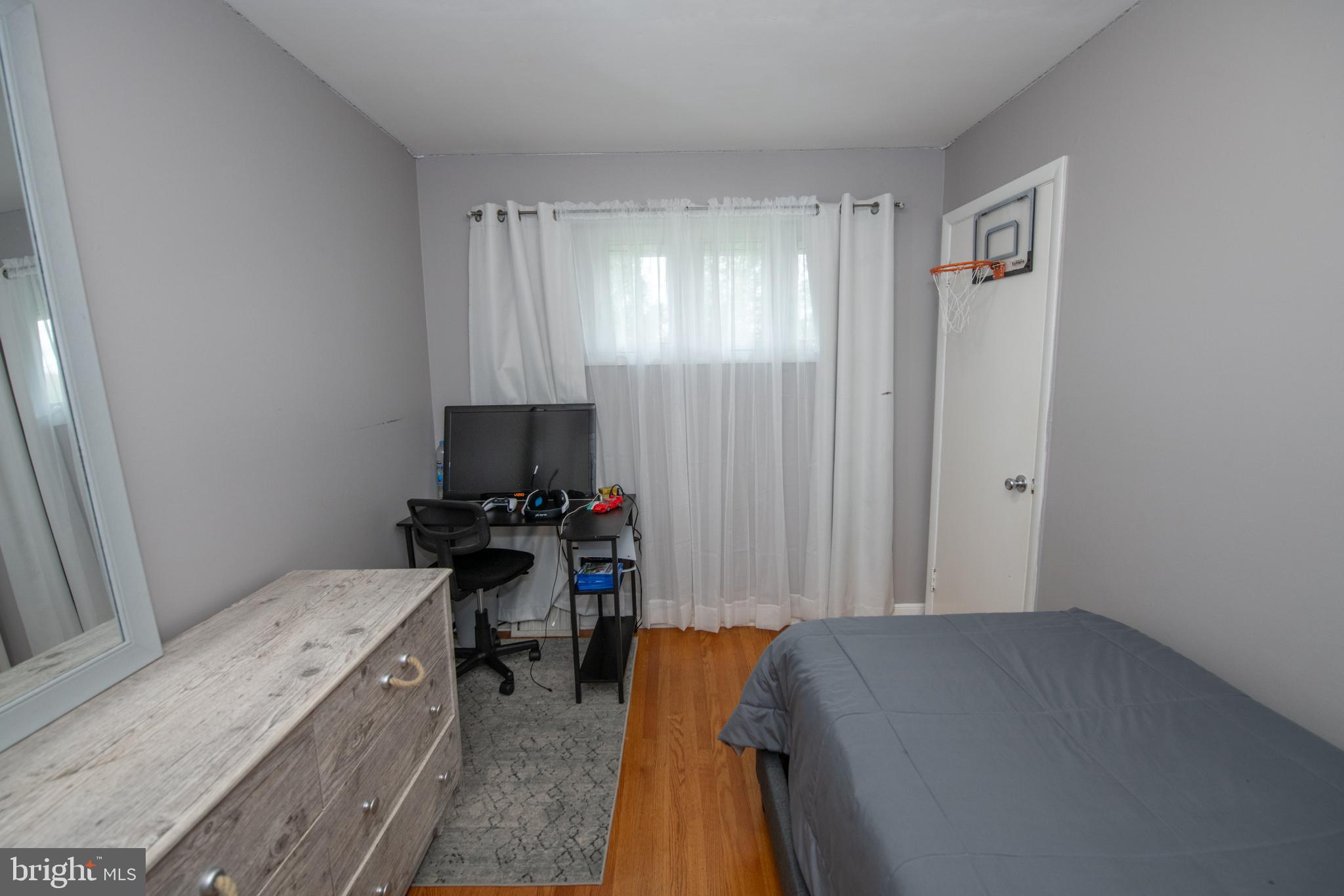 1309 Clyde Road Warminster, PA 18974 - Photo 33 of 39 a bedroom with a bed and a window
