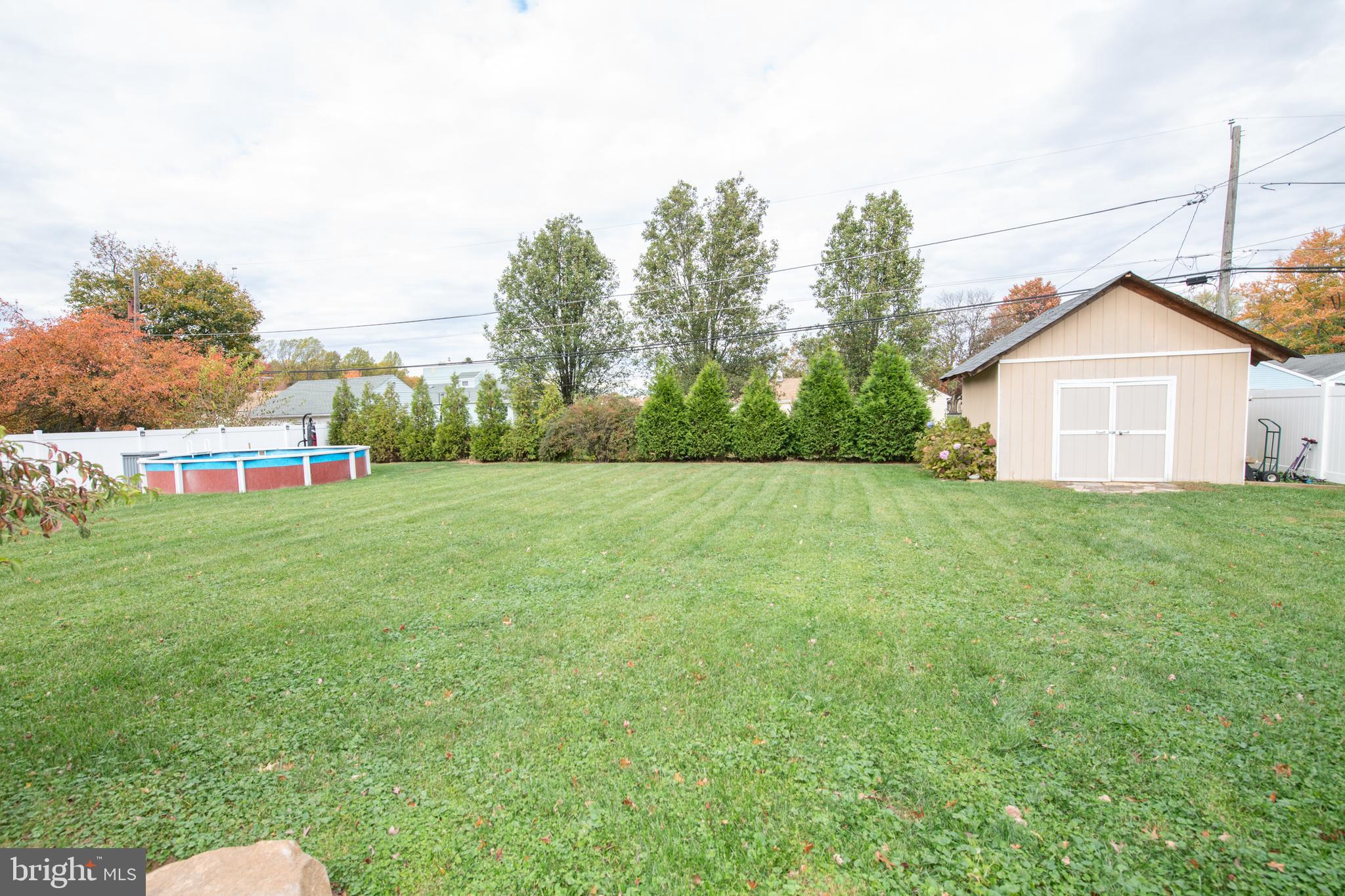1309 Clyde Road Warminster, PA 18974 - Photo 9 of 39 a view of a house with a backyard and a garden