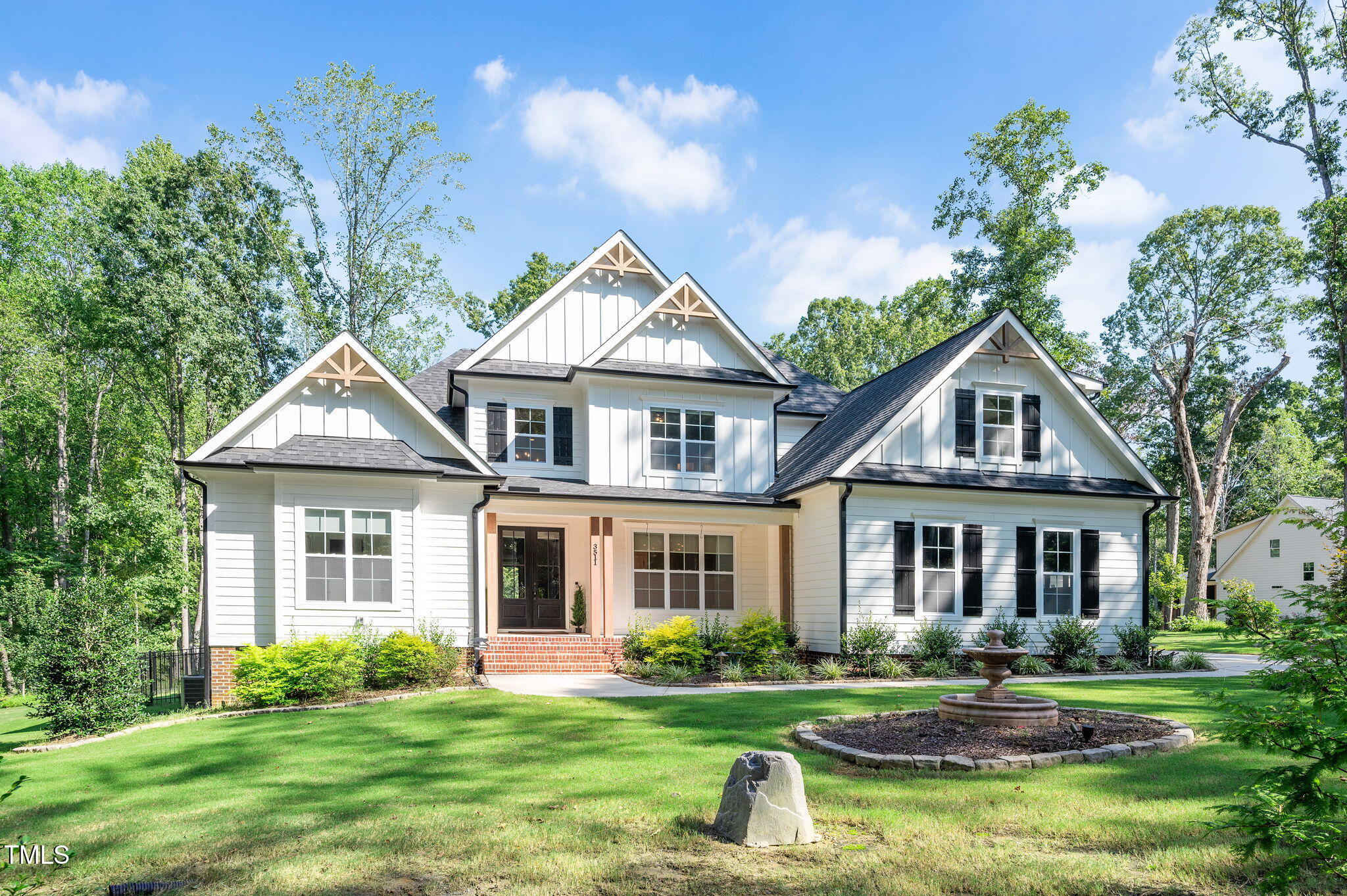 3511 Bruce Garner Road Wake Forest, NC 27587 - Photo 1 of 46 a front view of a house with a yard