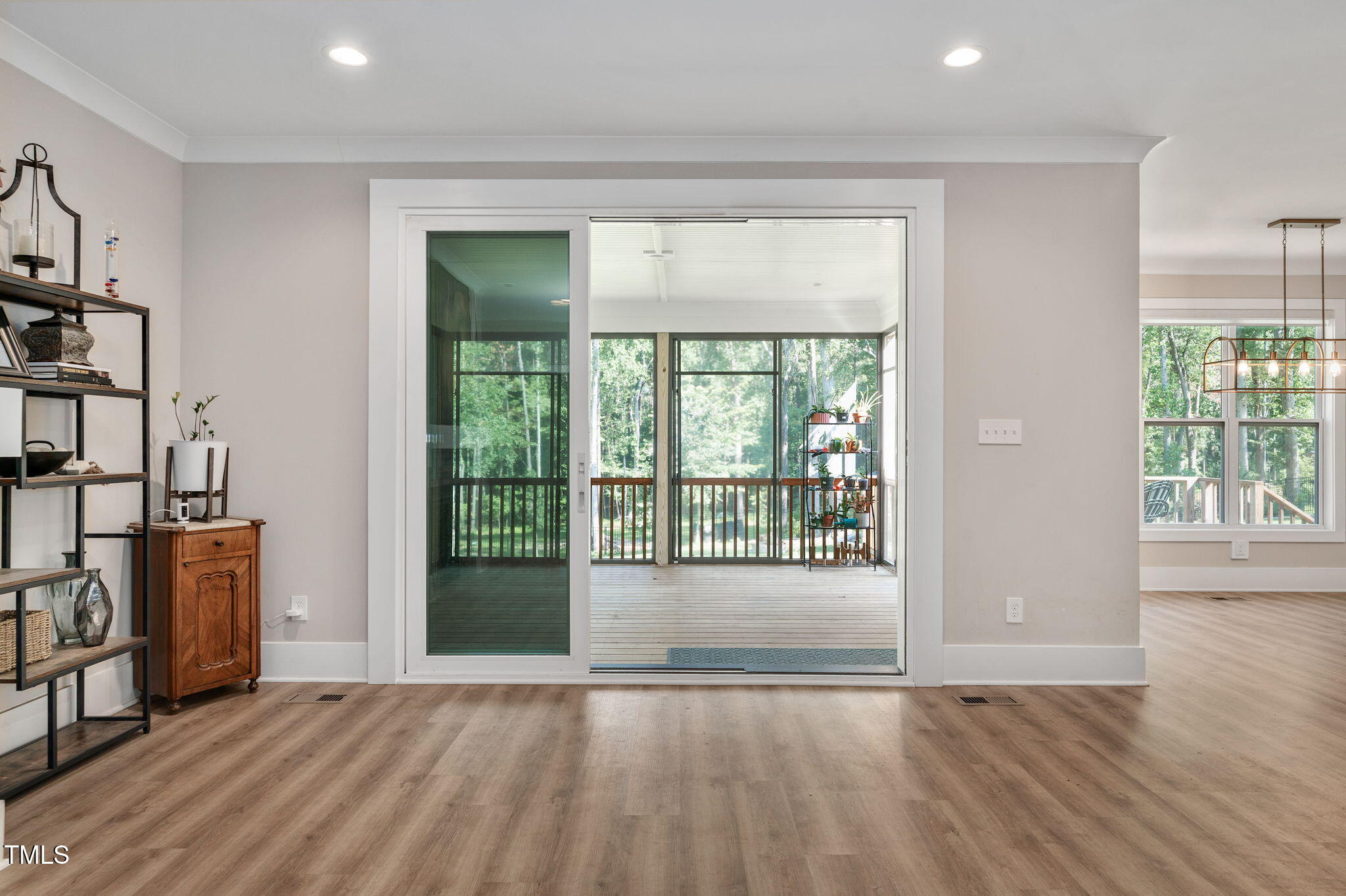 3511 Bruce Garner Road Wake Forest, NC 27587 - Photo 14 of 46 a view of an empty room with wooden floor and a window