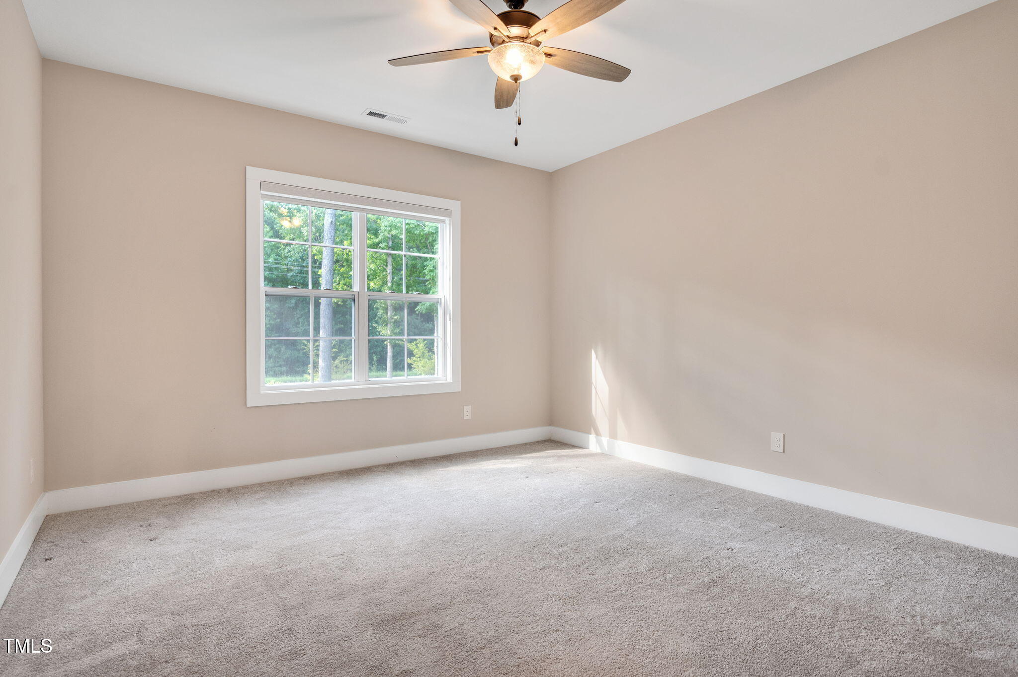 3511 Bruce Garner Road Wake Forest, NC 27587 - Photo 26 of 46 a view of an empty room with a window