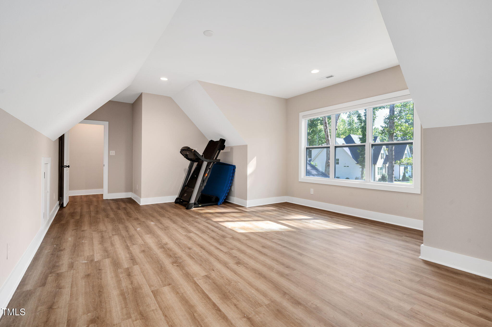 3511 Bruce Garner Road Wake Forest, NC 27587 - Photo 29 of 46 a view of empty room with wooden floor and fan