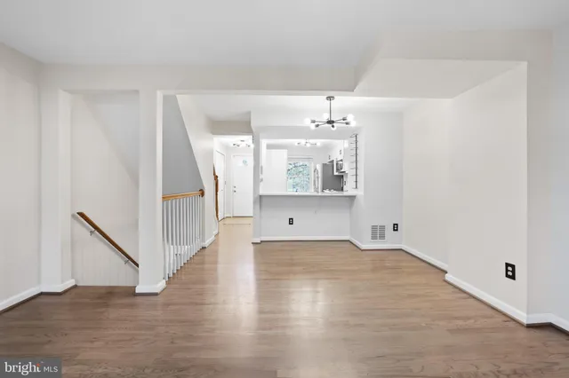 a bathroom with a shower a toilet and a sink