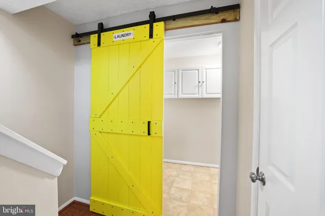 a view of a lake in between two of trees