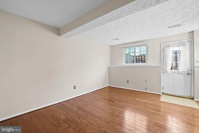 a view of a lake with outdoor seating