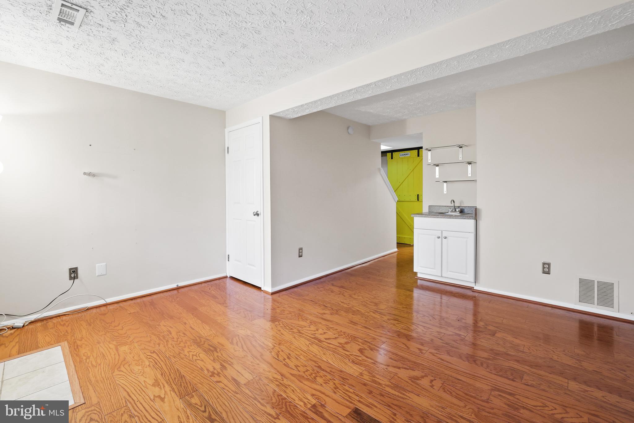 2858 New Providence Court Falls Church, VA 22042 - Photo 27 of 62 a view of a room with wooden floor