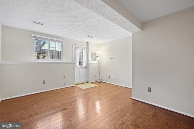 a view of a building with sitting area