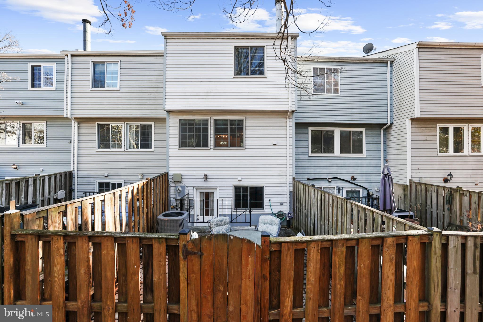 2858 New Providence Court Falls Church, VA 22042 - Photo 31 of 62 a view of a house with wooden fence