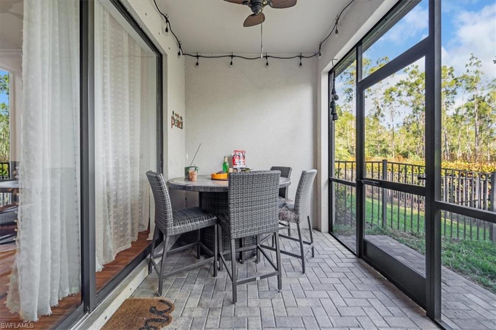 9052 Glenforest Drive Naples, FL 34120 - Photo 19 of 20 a view of a dining room with furniture window and outside view
