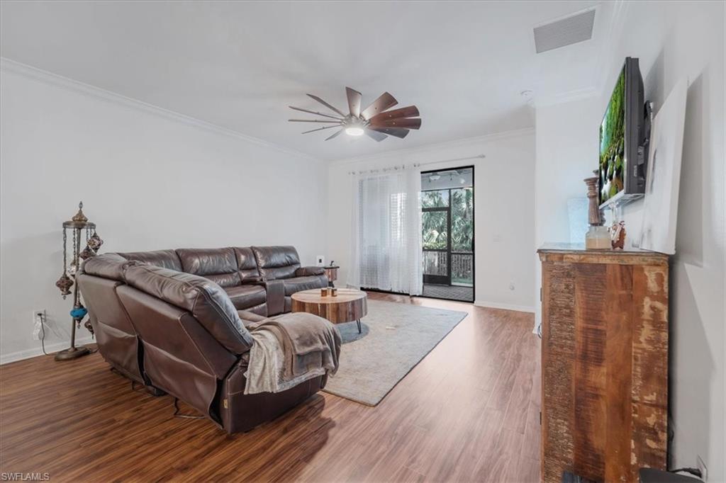 9052 Glenforest Drive Naples, FL 34120 - Photo 8 of 20 a living room with furniture