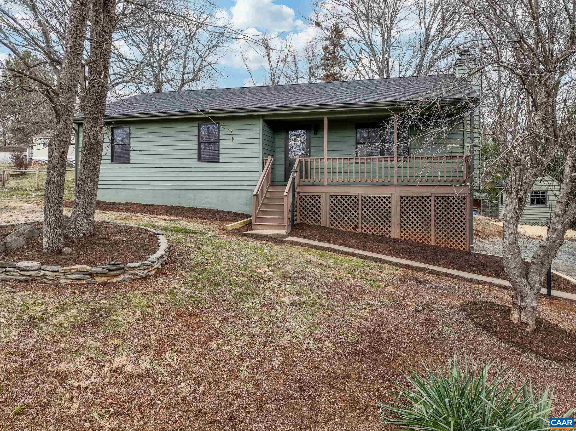 5582 Brookwood Road Crozet, VA 22932 - Photo 1 of 61 a house with trees in the background