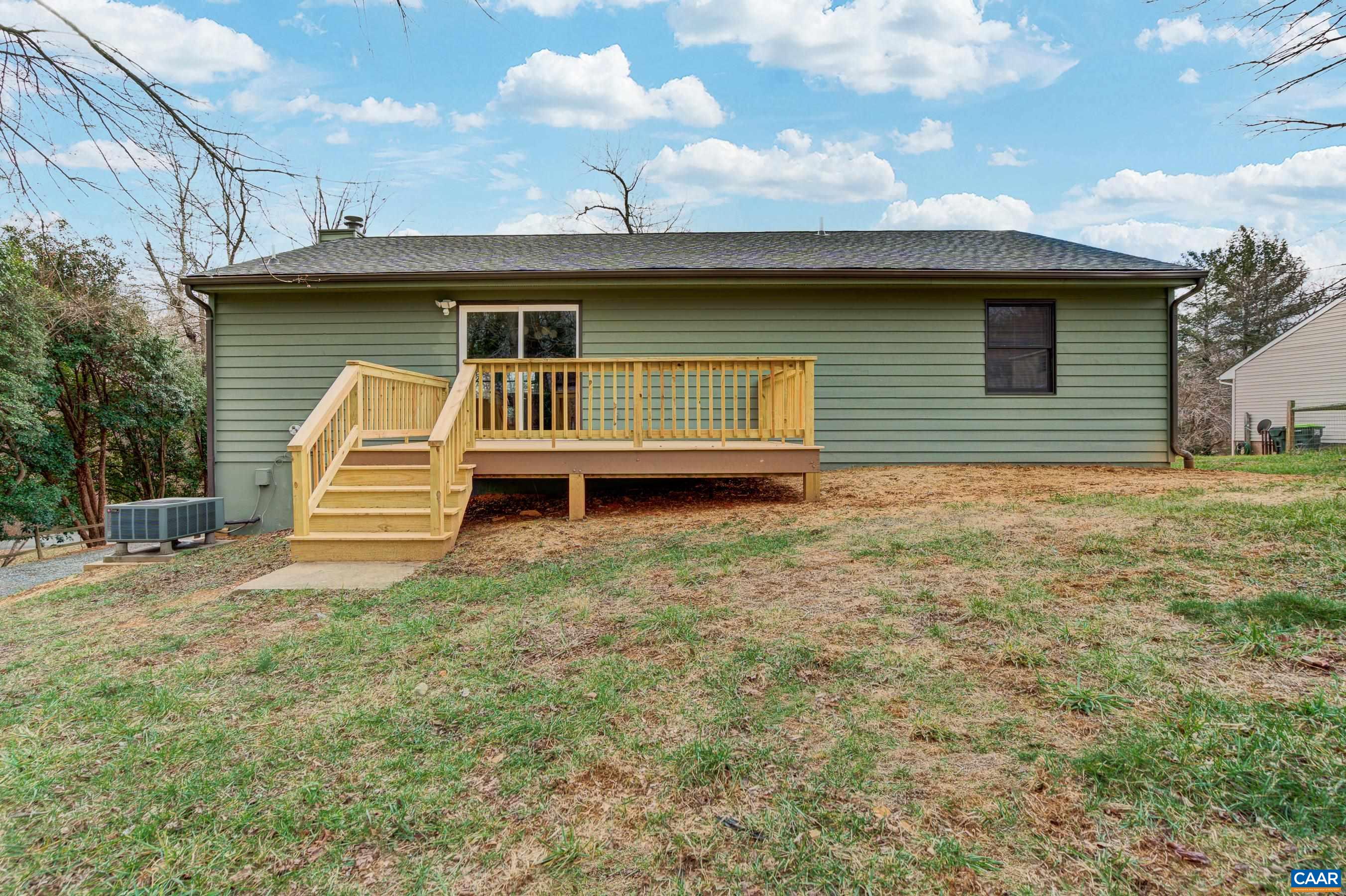5582 Brookwood Road Crozet, VA 22932 - Photo 2 of 61 a view of a house with a backyard