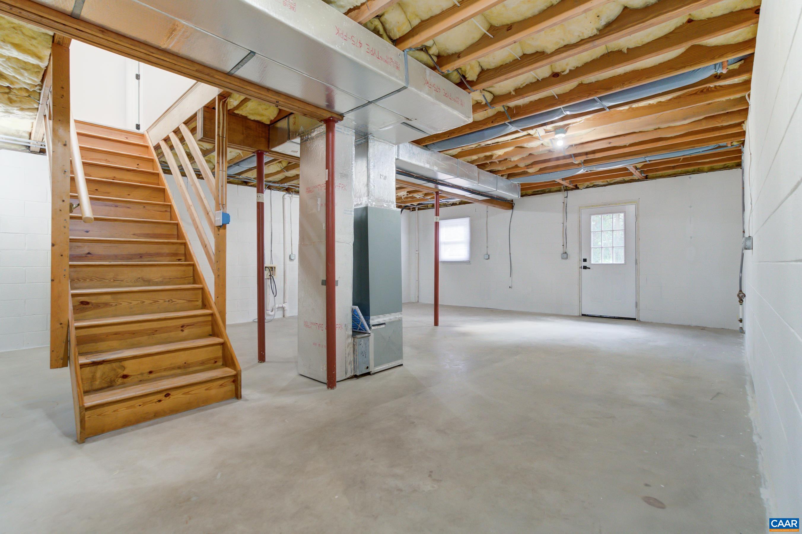 5582 Brookwood Road Crozet, VA 22932 - Photo 26 of 61 a view of a hallway with staircase