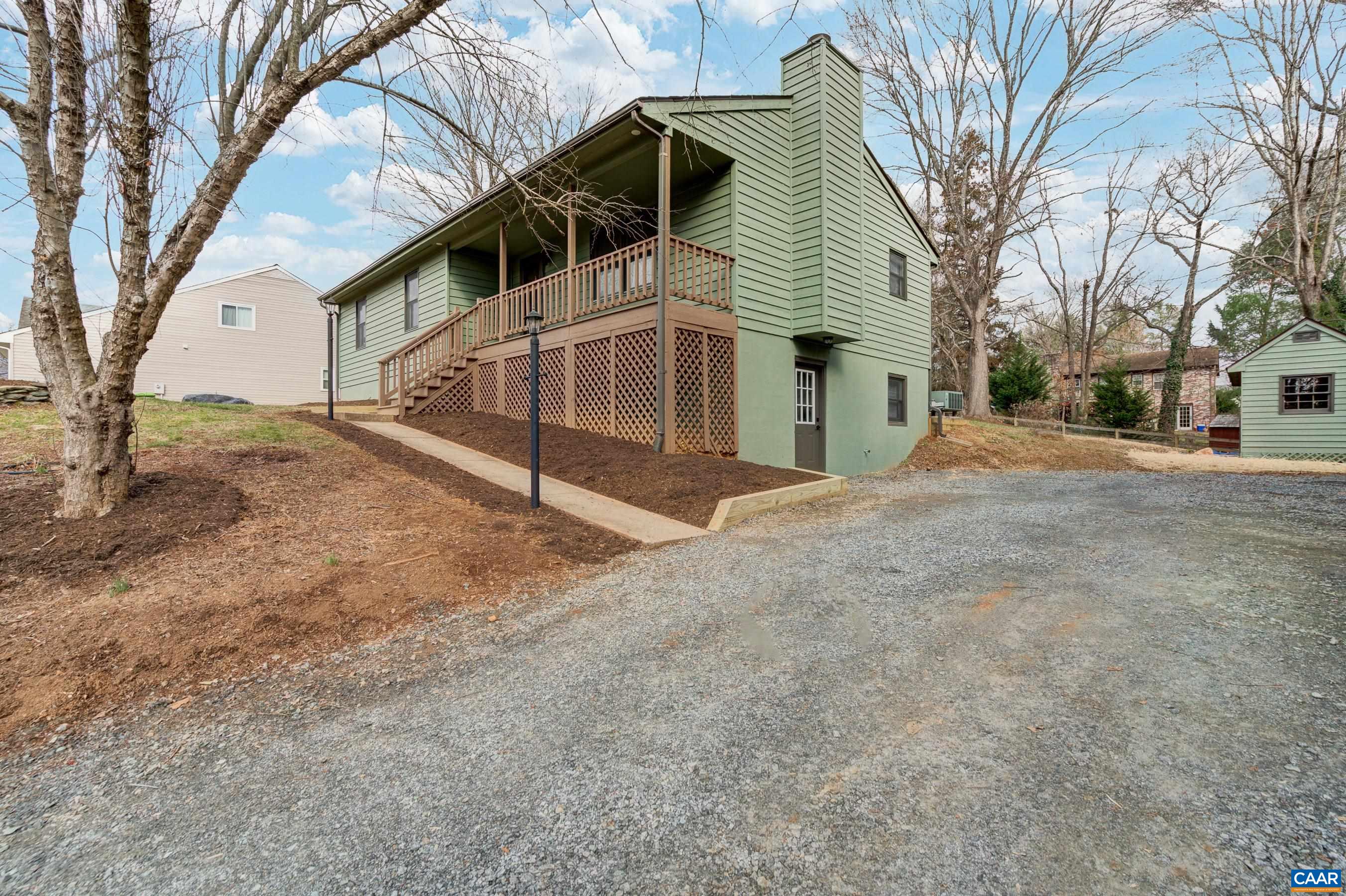 5582 Brookwood Road Crozet, VA 22932 - Photo 32 of 61 a view of a house with a yard