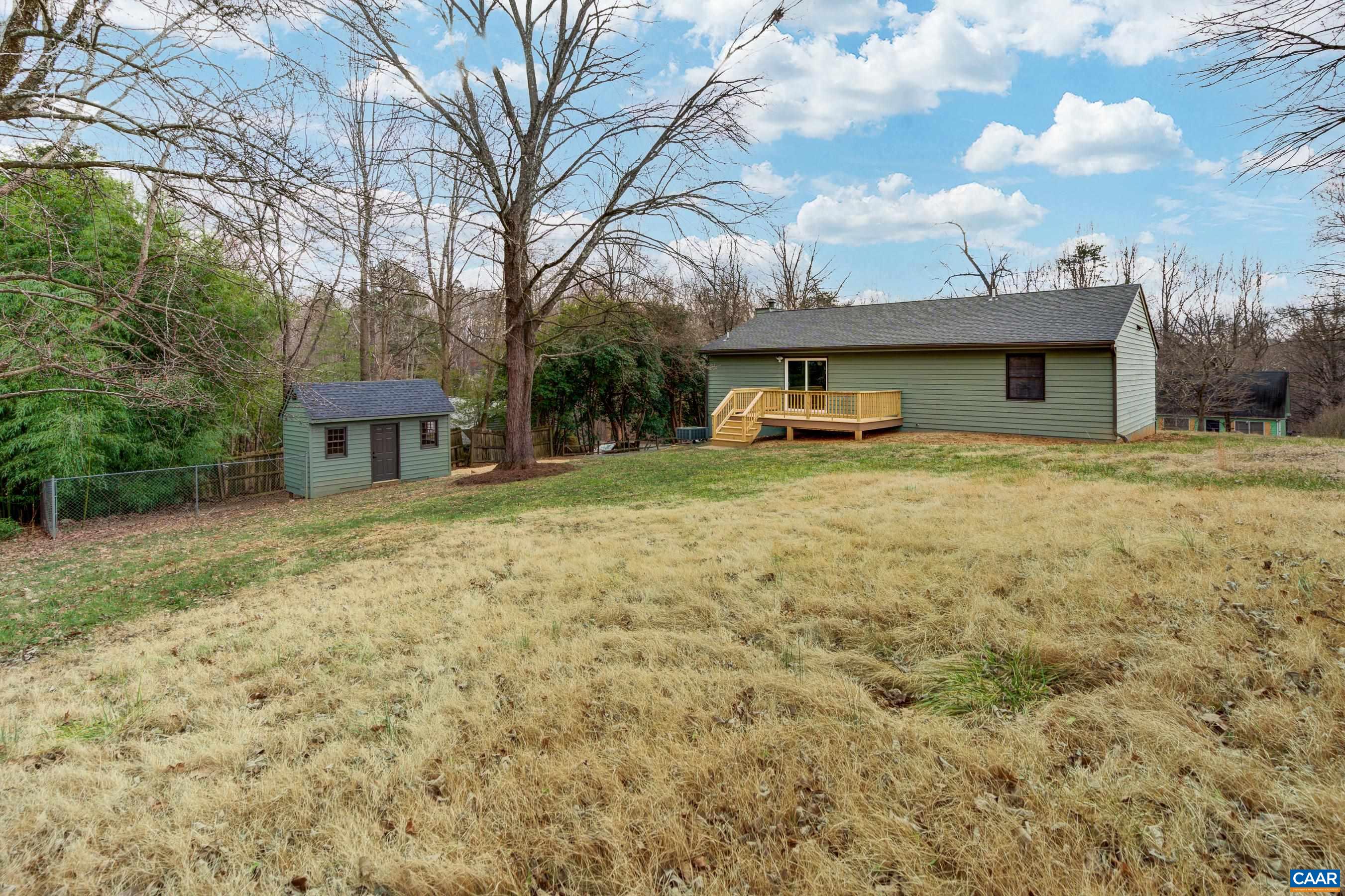 5582 Brookwood Road Crozet, VA 22932 - Photo 38 of 61 a house that has a tree in front of it