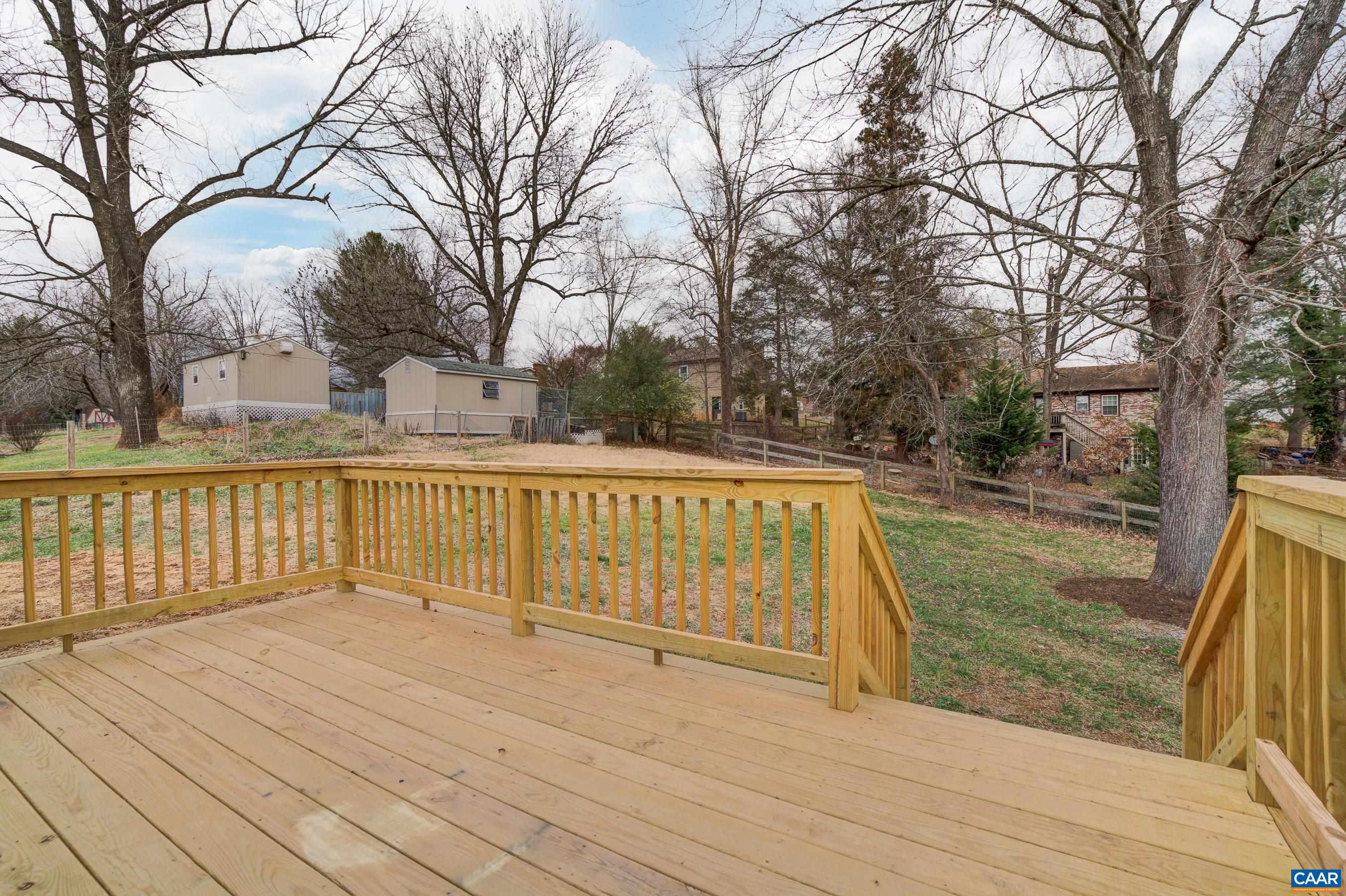 5582 Brookwood Road Crozet, VA 22932 - Photo 39 of 61 a view of outdoor space with deck and tree