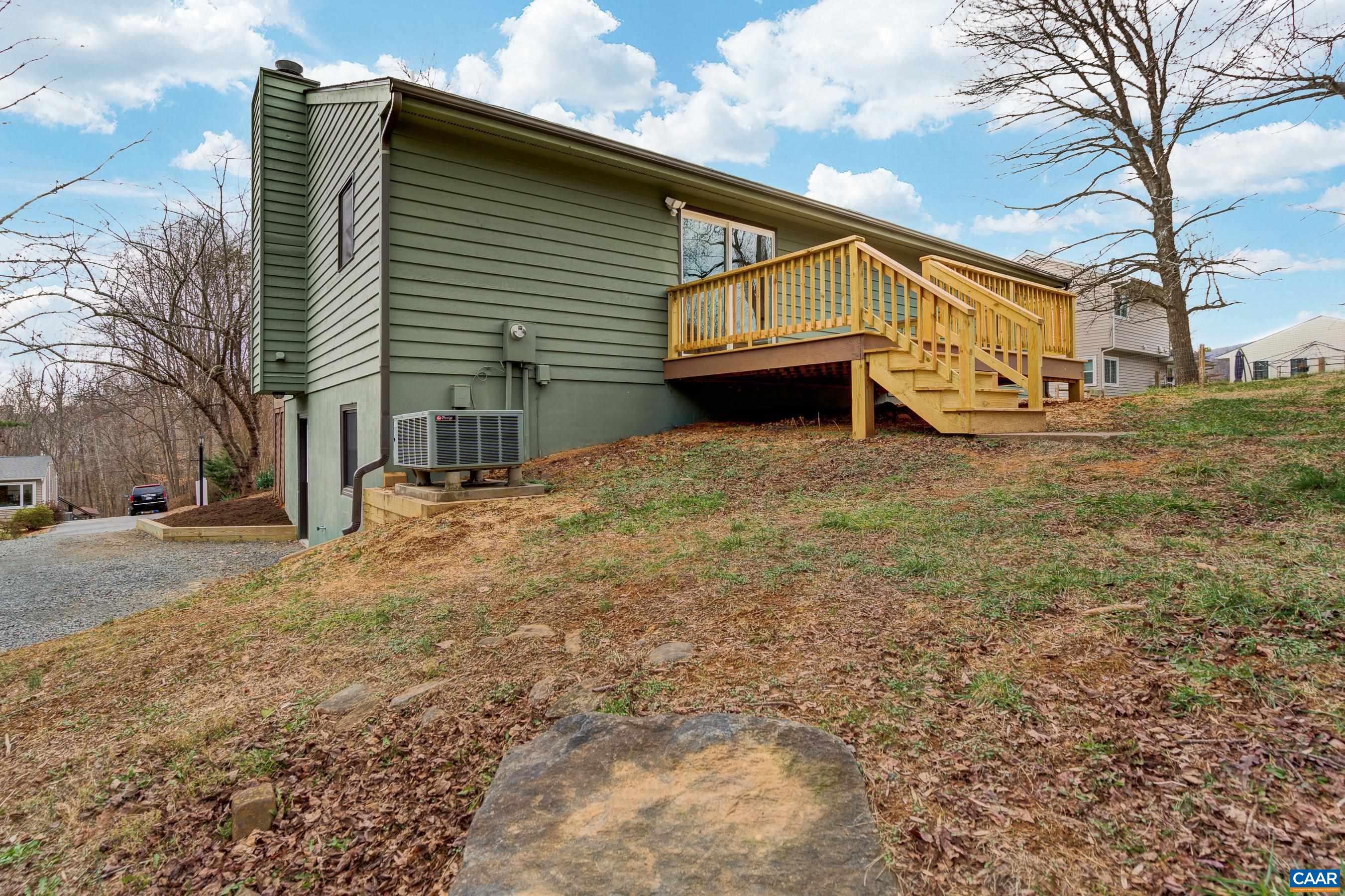5582 Brookwood Road Crozet, VA 22932 - Photo 43 of 61 a view of a house with a yard