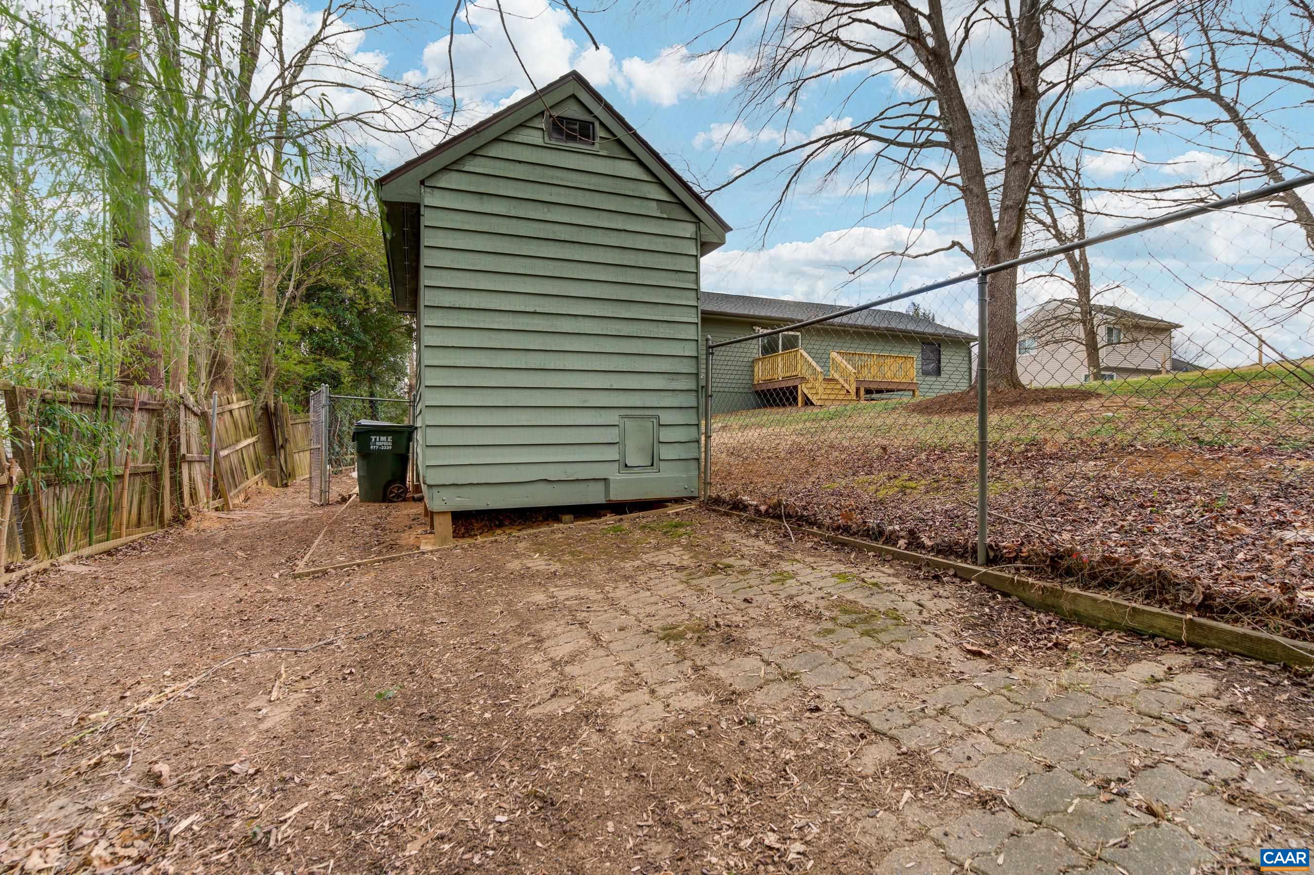 5582 Brookwood Road Crozet, VA 22932 - Photo 44 of 61 a view of a house with a backyard