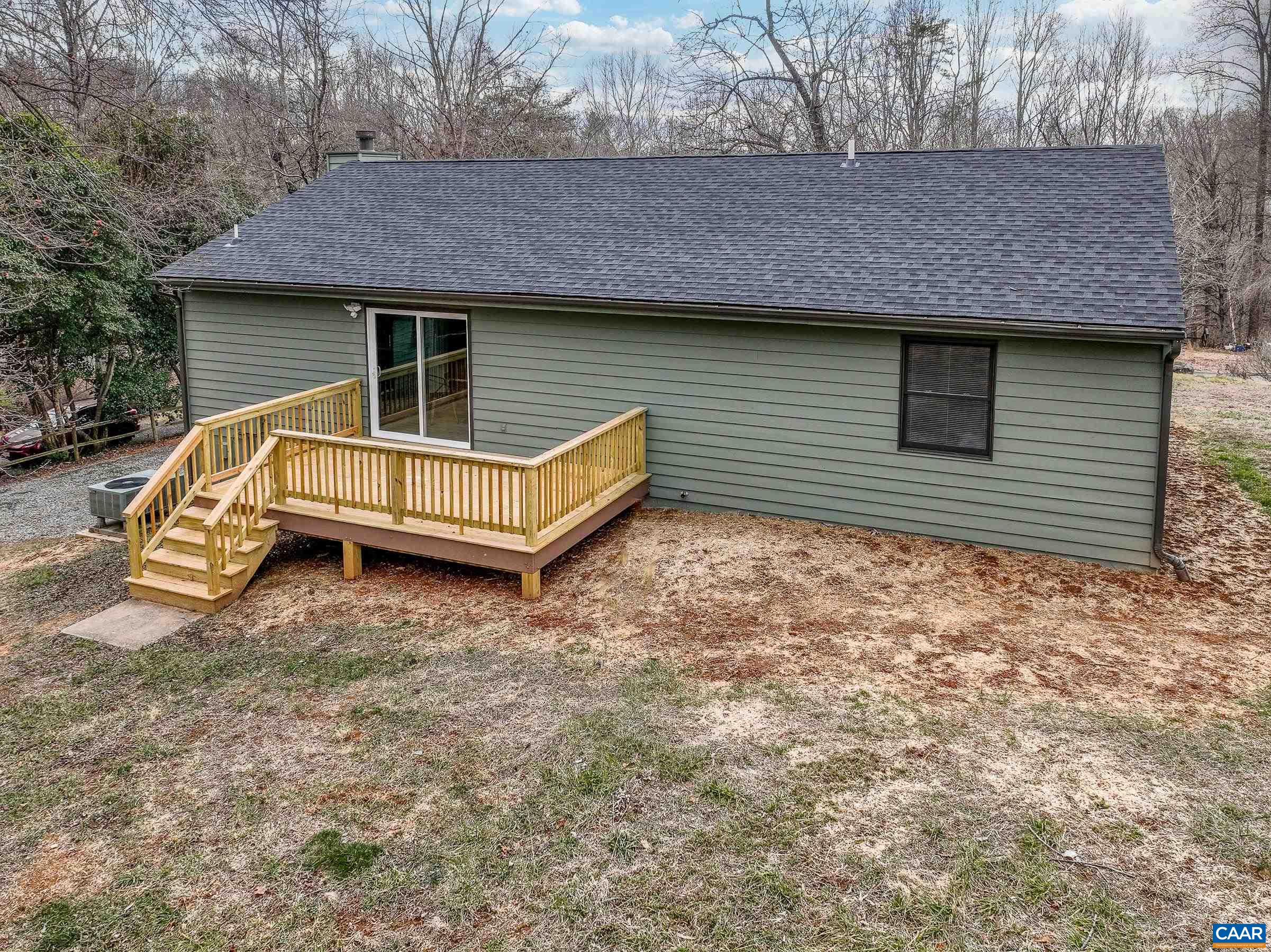 5582 Brookwood Road Crozet, VA 22932 - Photo 58 of 61 a front view of a house with a yard