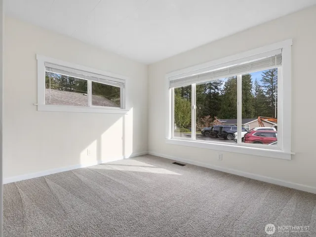a view of empty room with front door