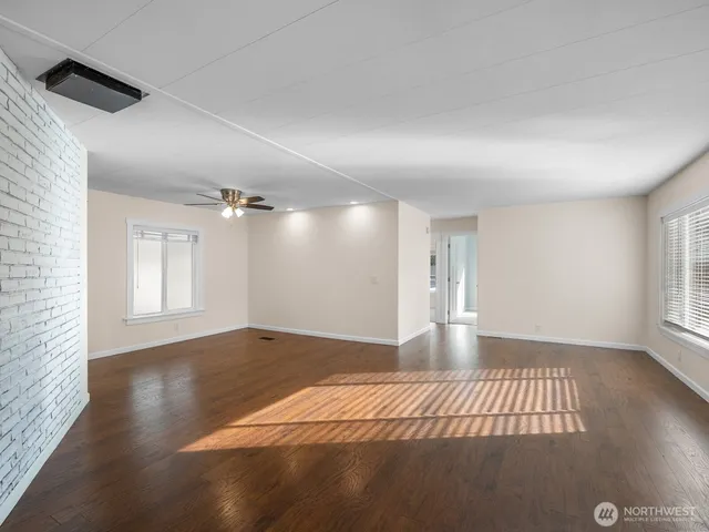 a view of an empty room and window