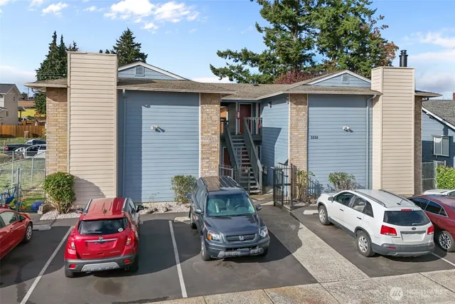 a car parked in front of a house