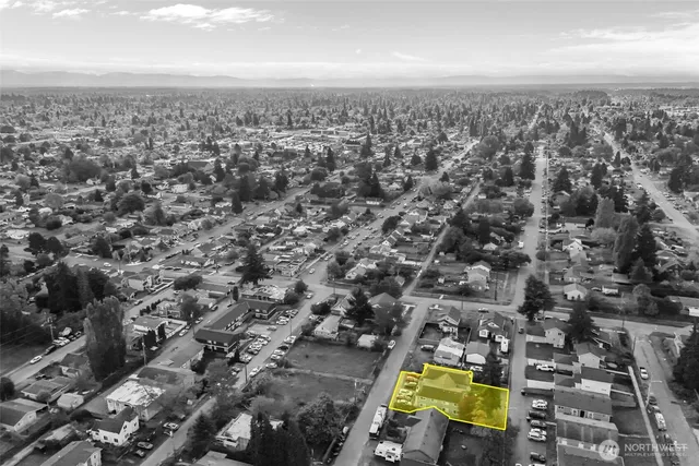 an aerial view of residential building with parking space