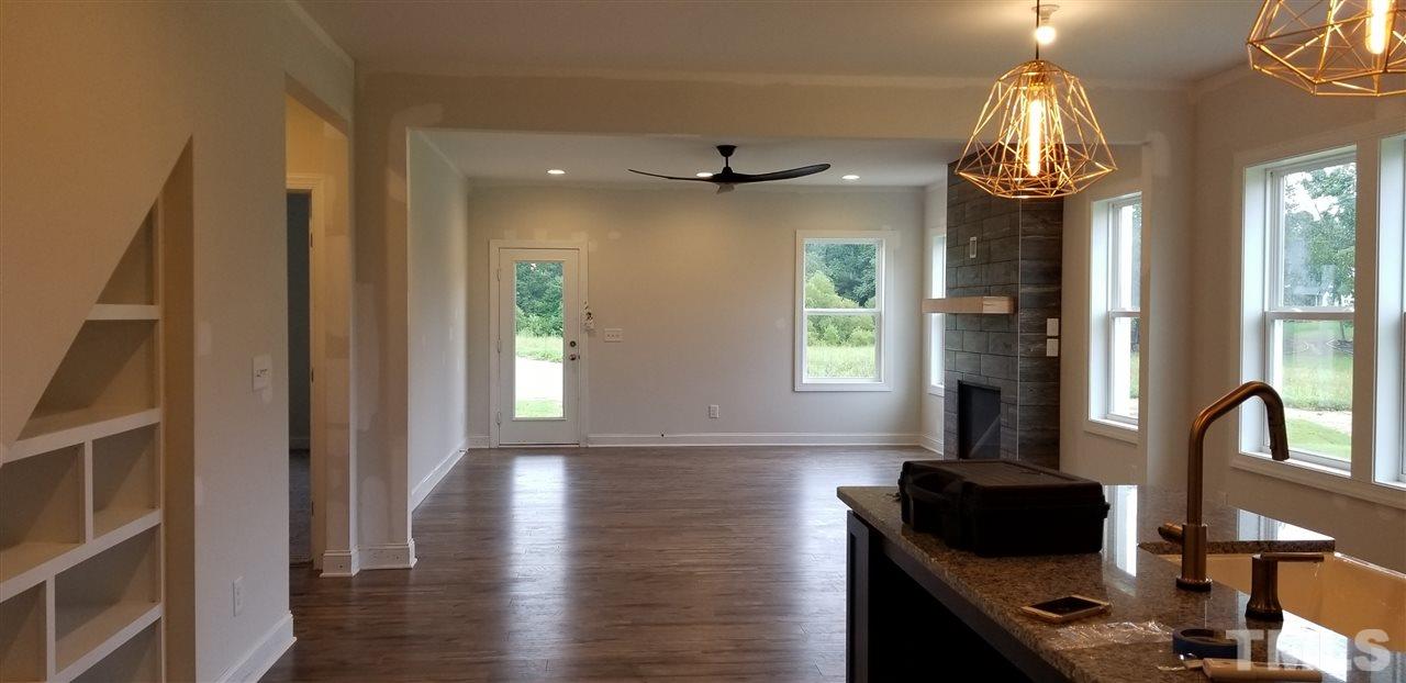 6617 Parizade Street Raleigh, NC 27603 - Photo 5 of 20 ask about adding the built in bookshelves!