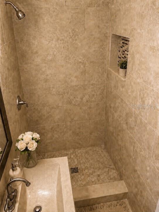 1623 Wavecrest Street Merritt Island, FL 32952 - Photo 12 of 26 a bathroom with a shower
