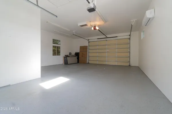 a view of a livingroom with furniture and window