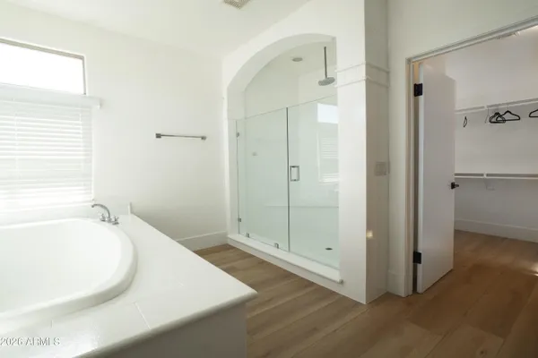 a view of entryway with wooden floor