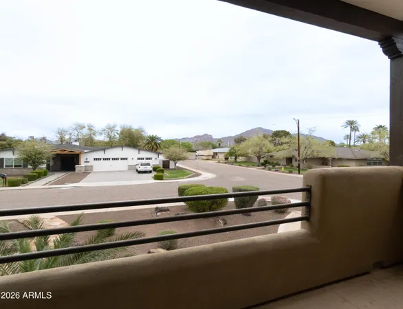a view of a balcony with an outdoor space