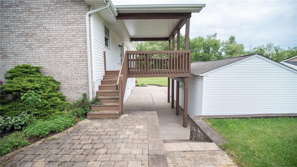 141 Singleton Road Sarver, PA 16055 - Photo 23 of 23 a view of a pathway of a house with a patio