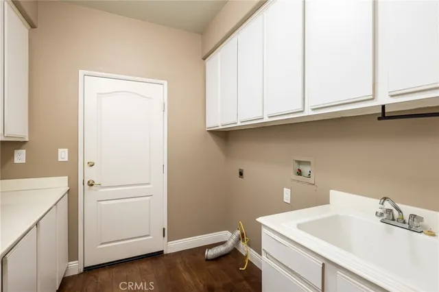 a bathroom with a sink a toilet and a vanity