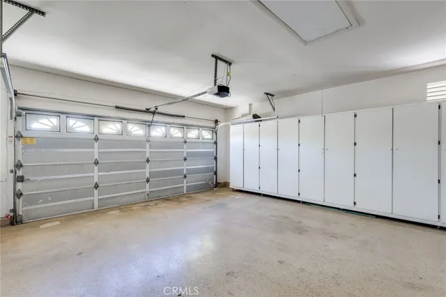 a patio with table and chairs