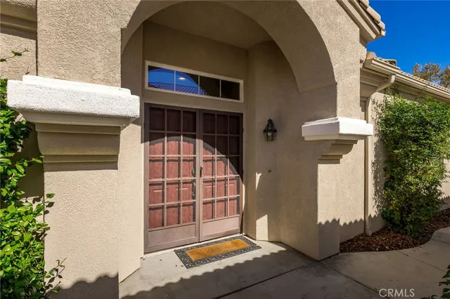 a front view of a house with a garage