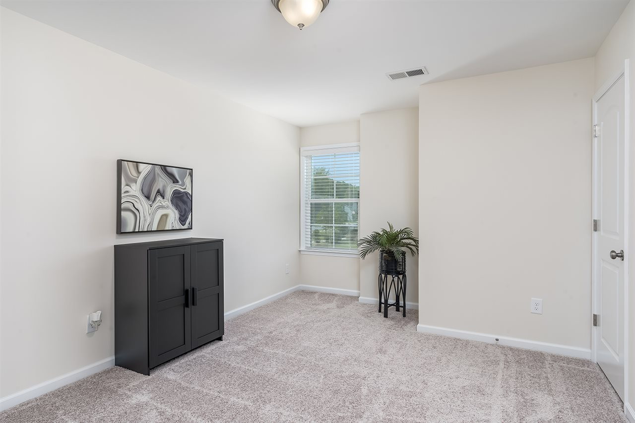 312 Morgan Ridge Road Holly Springs, NC 27540 - Photo 17 of 30 Bedroom 4 with Walk-In Closet