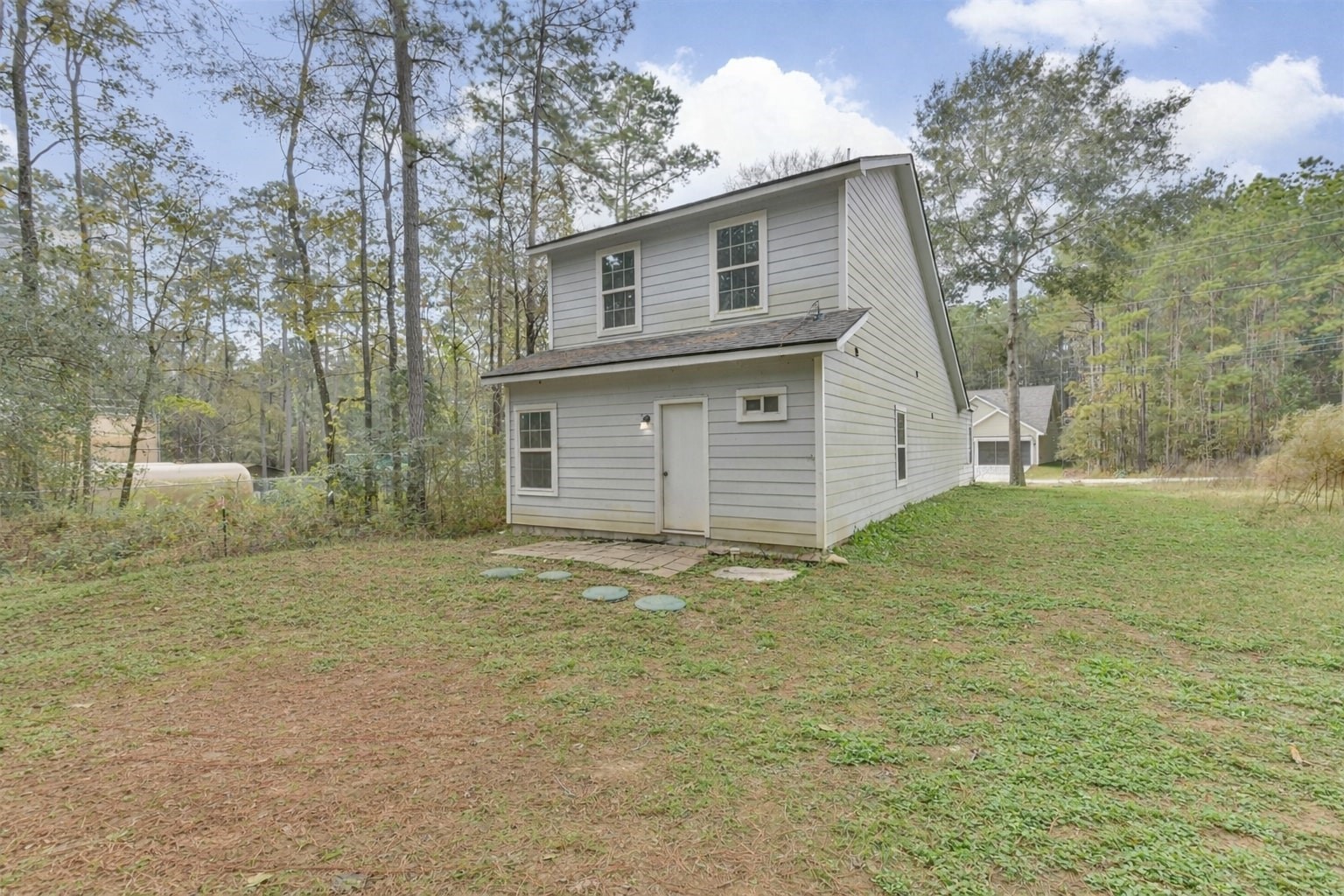 15514 Hickory Drive Montgomery, TX 77356 - Photo 14 of 26 a house with yard in front of it