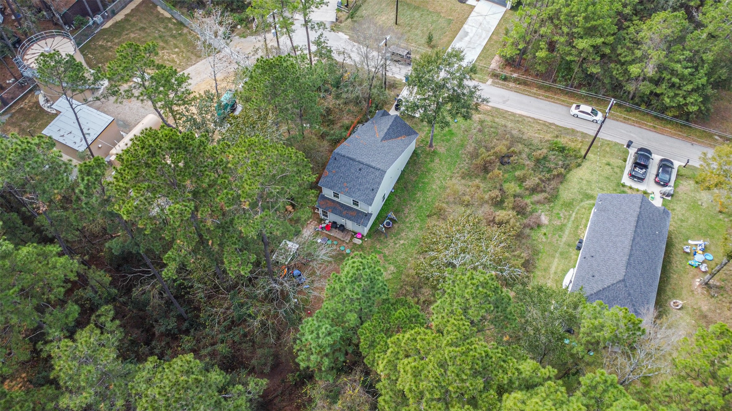 15514 Hickory Drive Montgomery, TX 77356 - Photo 18 of 26 an aerial view of a house with a yard and garden