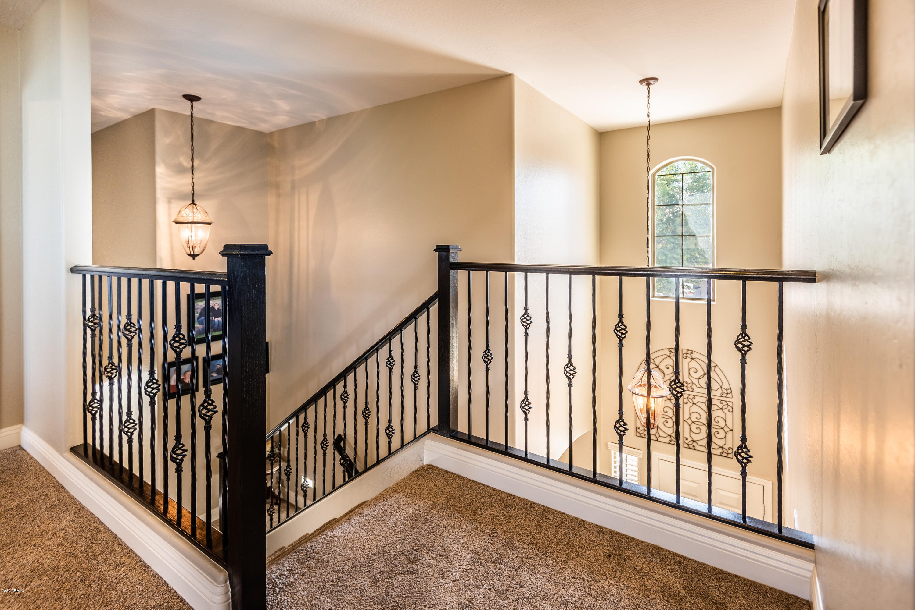 13628 West Calavar Road Surprise, AZ 85379 - Photo 23 of 48 a view of a hallway with windows