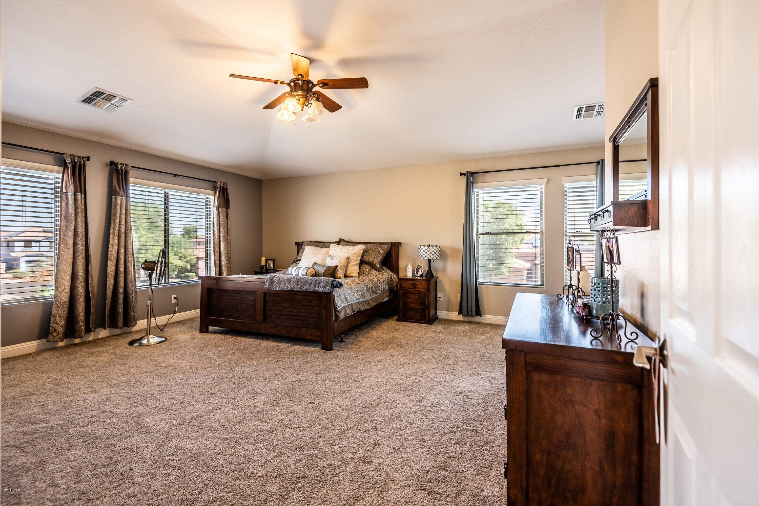 13628 West Calavar Road Surprise, AZ 85379 - Photo 27 of 48 a living room with furniture and a large window