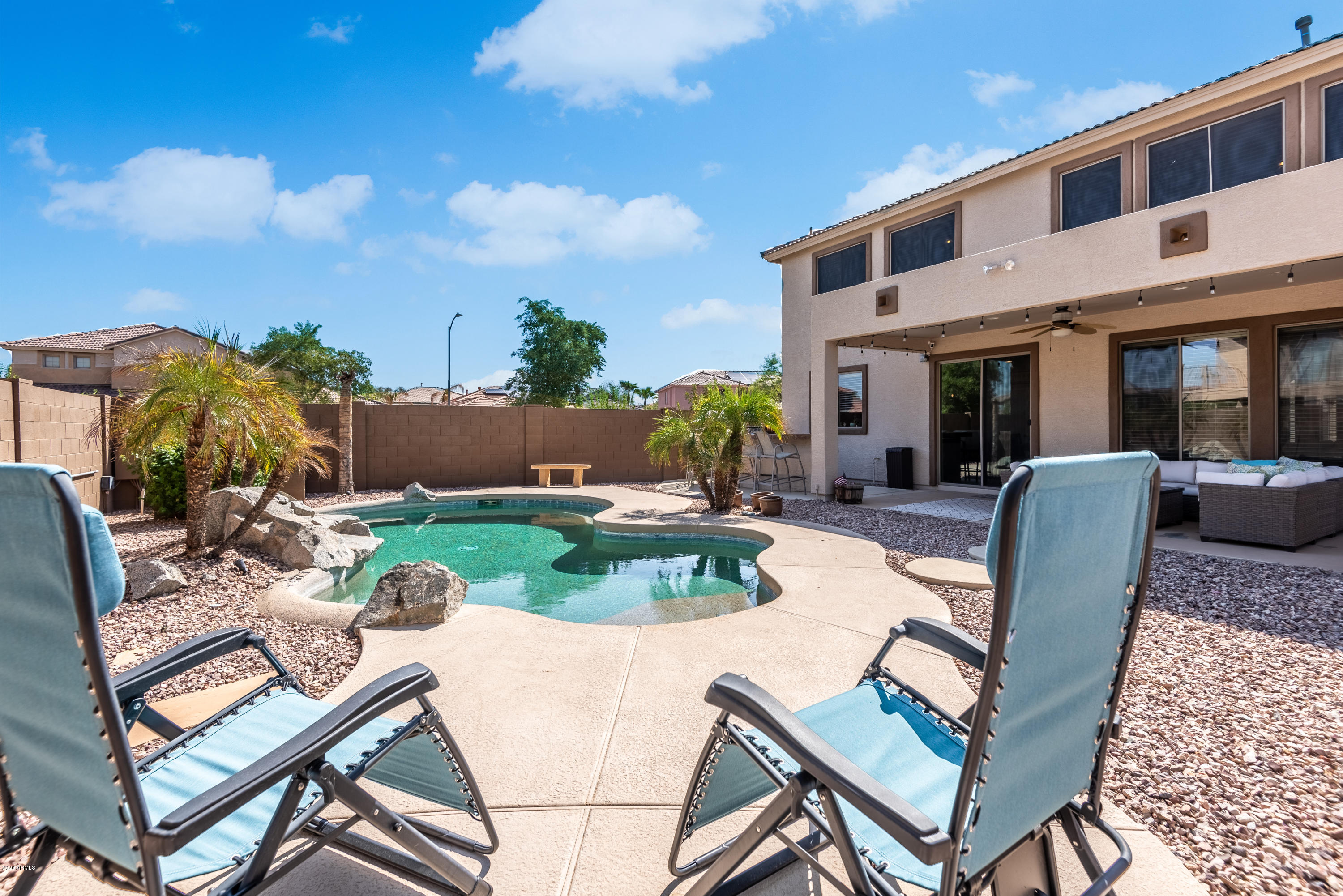 13628 West Calavar Road Surprise, AZ 85379 - Photo 41 of 48 a view of a backyard with furniture